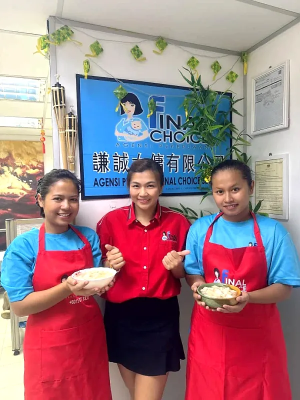 Trainee in a Final Choice apron during a household skills session
